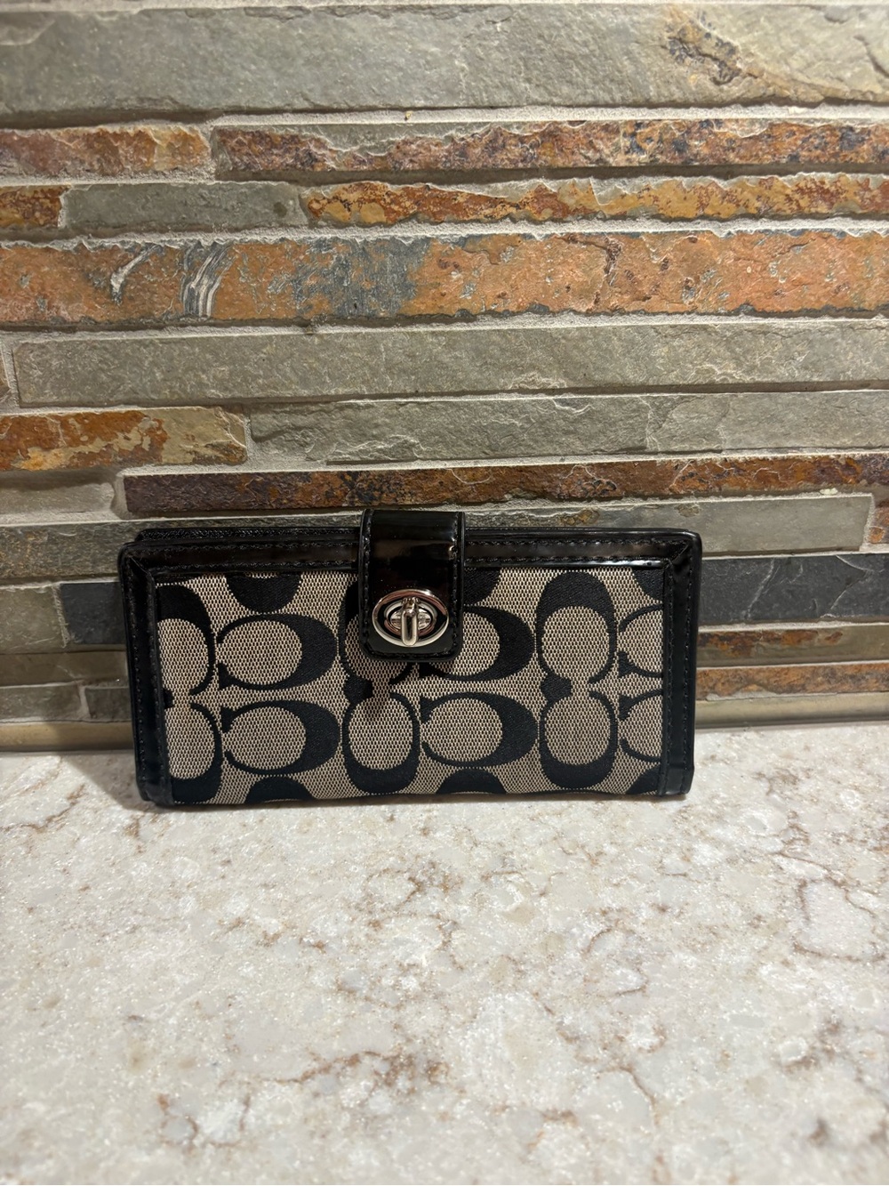Coach Black/Tan Signature Turnlock Continental Wallet